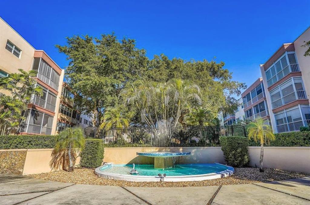 6731 Cypress Road, Unit 309 Plantation, FL 33317 - Photo 23 of 24 a view of a fountain in front of building