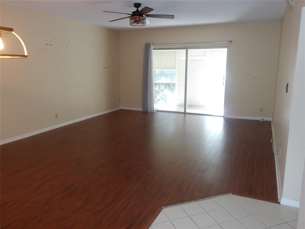 6731 Cypress Road, Unit 309 Plantation, FL 33317 - Photo 5 of 24 an empty room with a window