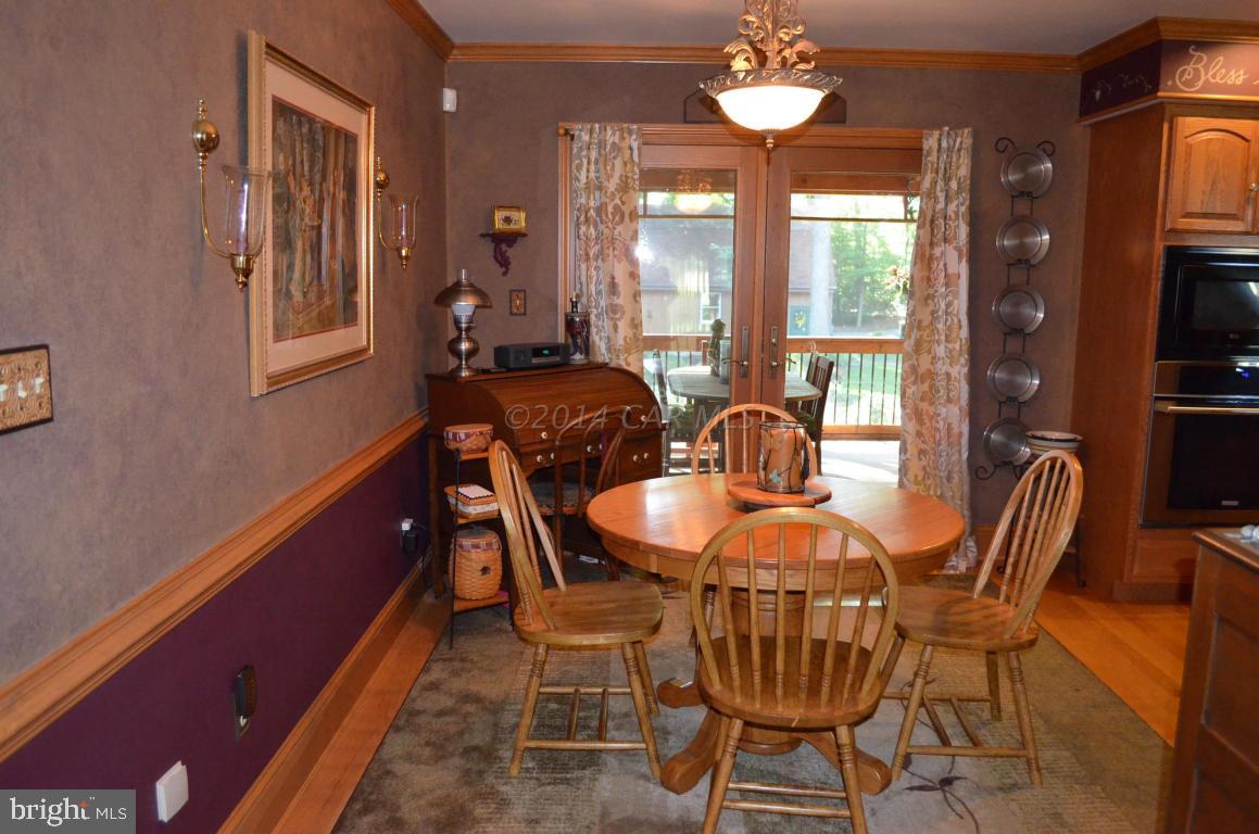 309 Silva Road Stockton, MD 21864 - Photo 27 of 67 a dining room with furniture and window