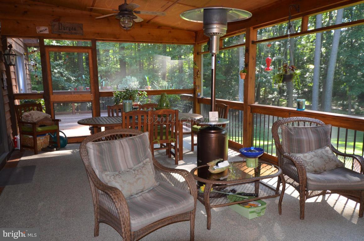 309 Silva Road Stockton, MD 21864 - Photo 49 of 67 a view of a dining room with furniture window and outside view