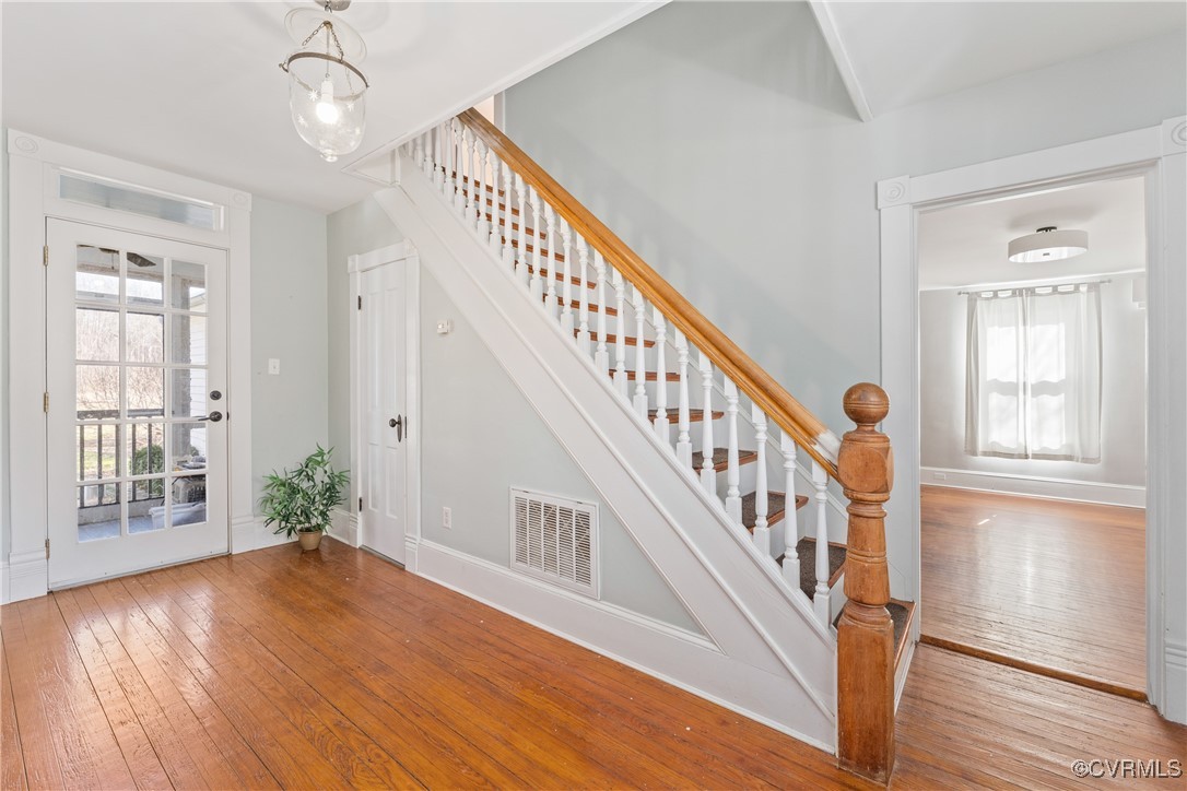 1092 Hull Neck Road Heathsville, VA 22473 - Photo 11 of 50 foyer & Stairs featuring Original heart pine floor