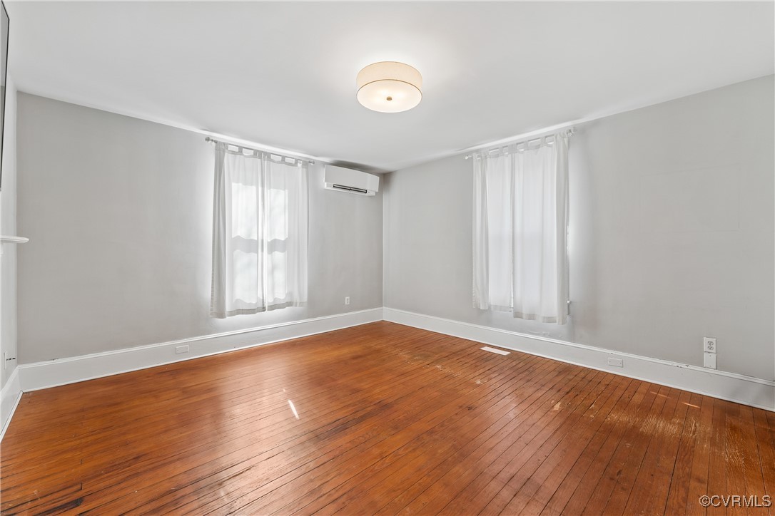 1092 Hull Neck Road Heathsville, VA 22473 - Photo 25 of 50 Living room with Original heart pine floors, mini