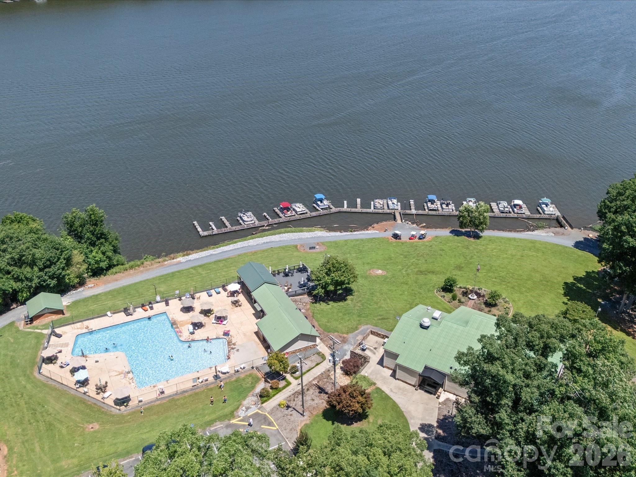 293 Manchester Road Mount Gilead, NC 27306 - Photo 14 of 18 a view of a table and chairs in a garden