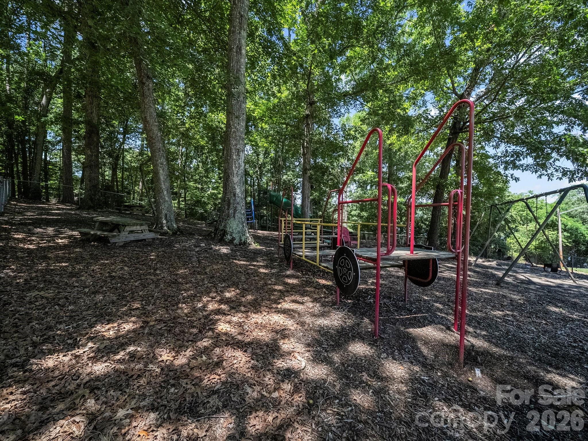 293 Manchester Road Mount Gilead, NC 27306 - Photo 6 of 18 a view of a park with large trees