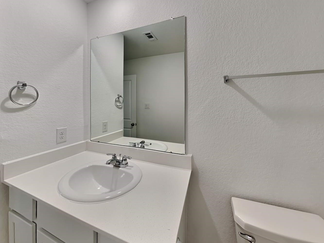 18606 Via Barletta Lane New Caney, TX 77357 - Photo 15 of 16 a bathroom with a sink and a toilet