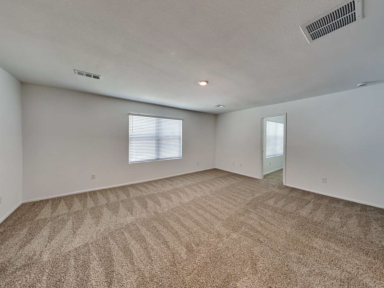 18606 Via Barletta Lane New Caney, TX 77357 - Photo 6 of 16 a view of an empty room with a window