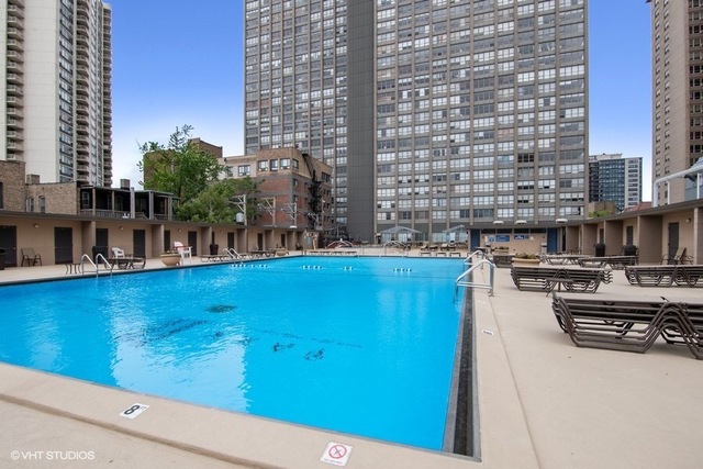655 West Irving Park Road, Unit 2311 Chicago, IL 60613 - Photo 18 of 21 a view of swimming pool from a balcony