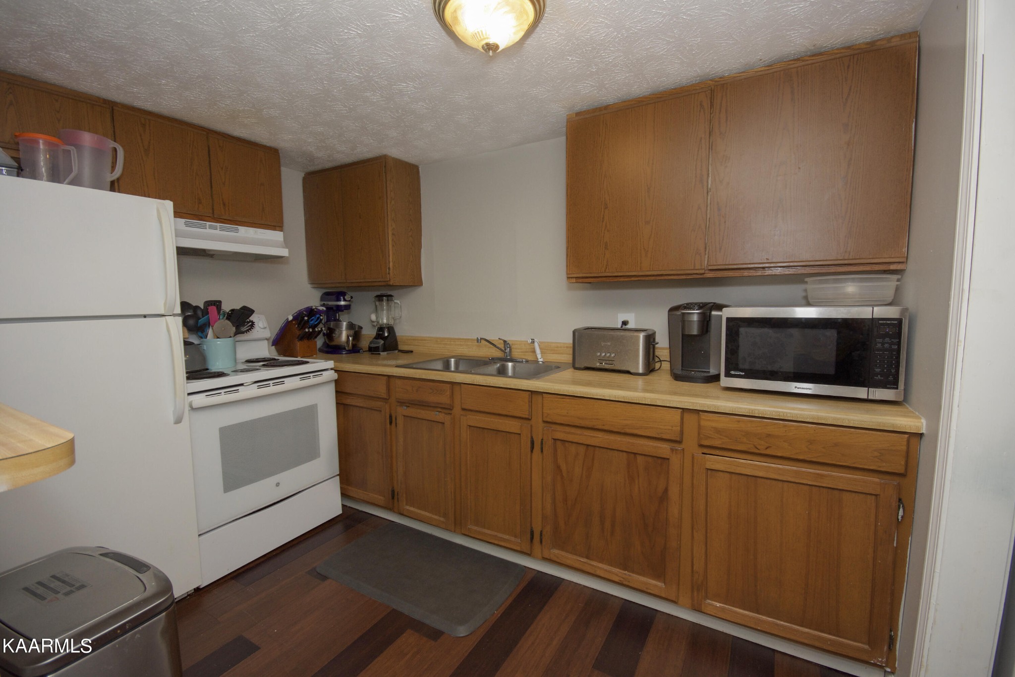 145 Johnson Road Oak Ridge, TN 37830 - Photo 11 of 26 a kitchen with a sink cabinets and appliances