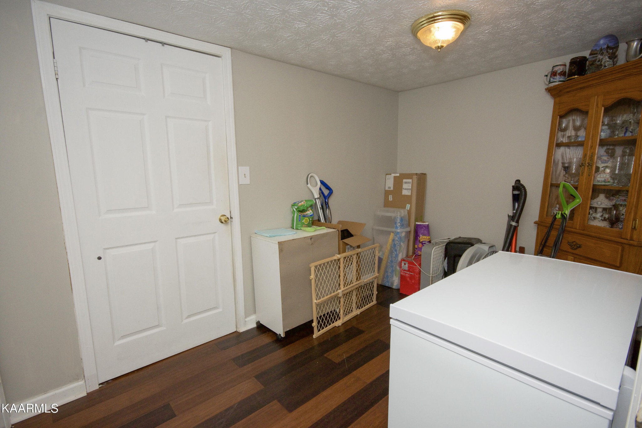 145 Johnson Road Oak Ridge, TN 37830 - Photo 21 of 26 a storage room with washer and dryer