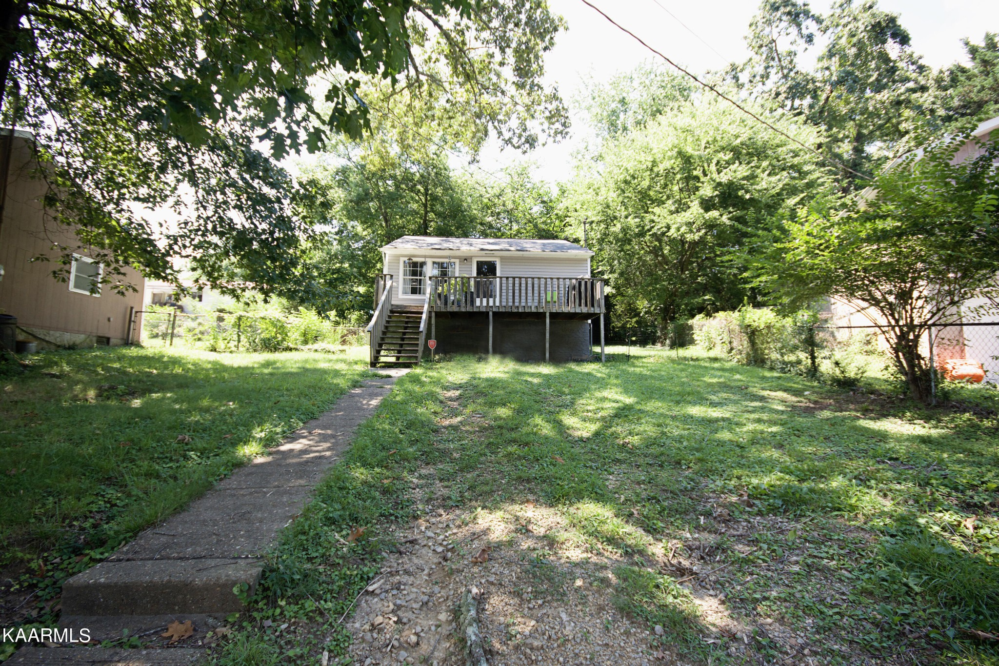 145 Johnson Road Oak Ridge, TN 37830 - Photo 3 of 26 a view of a house with a yard