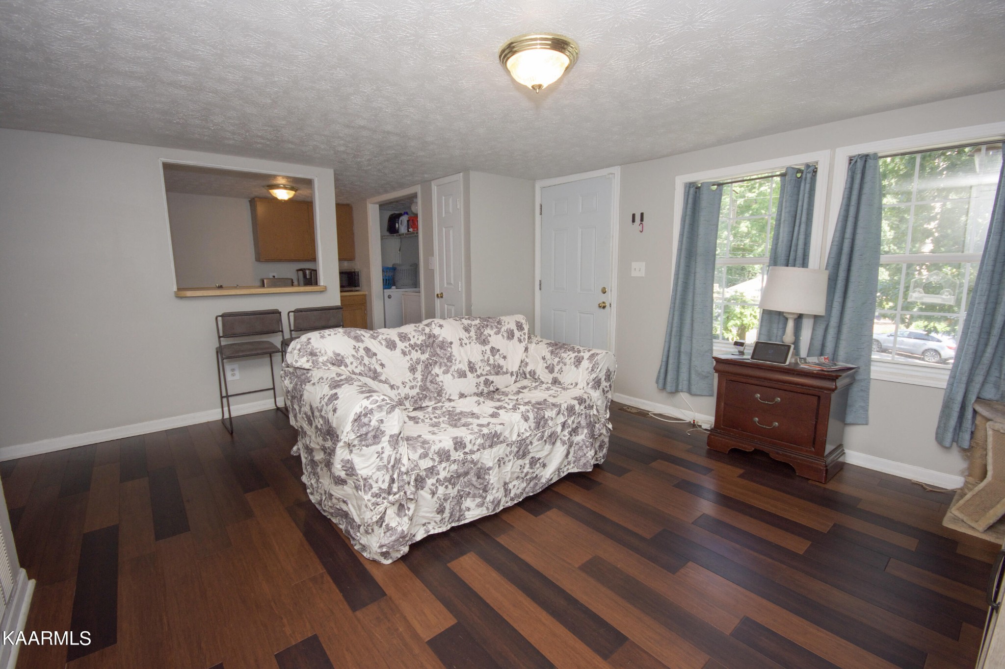 145 Johnson Road Oak Ridge, TN 37830 - Photo 9 of 26 a living room with couch and a window