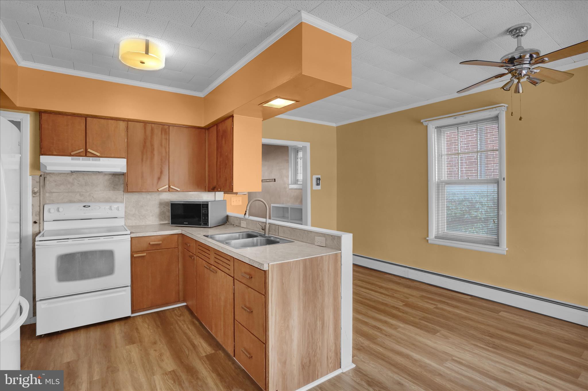 505 Friedensburg Road Reading, PA 19606 - Photo 11 of 40 a kitchen with a sink cabinets stainless steel appliances and a window