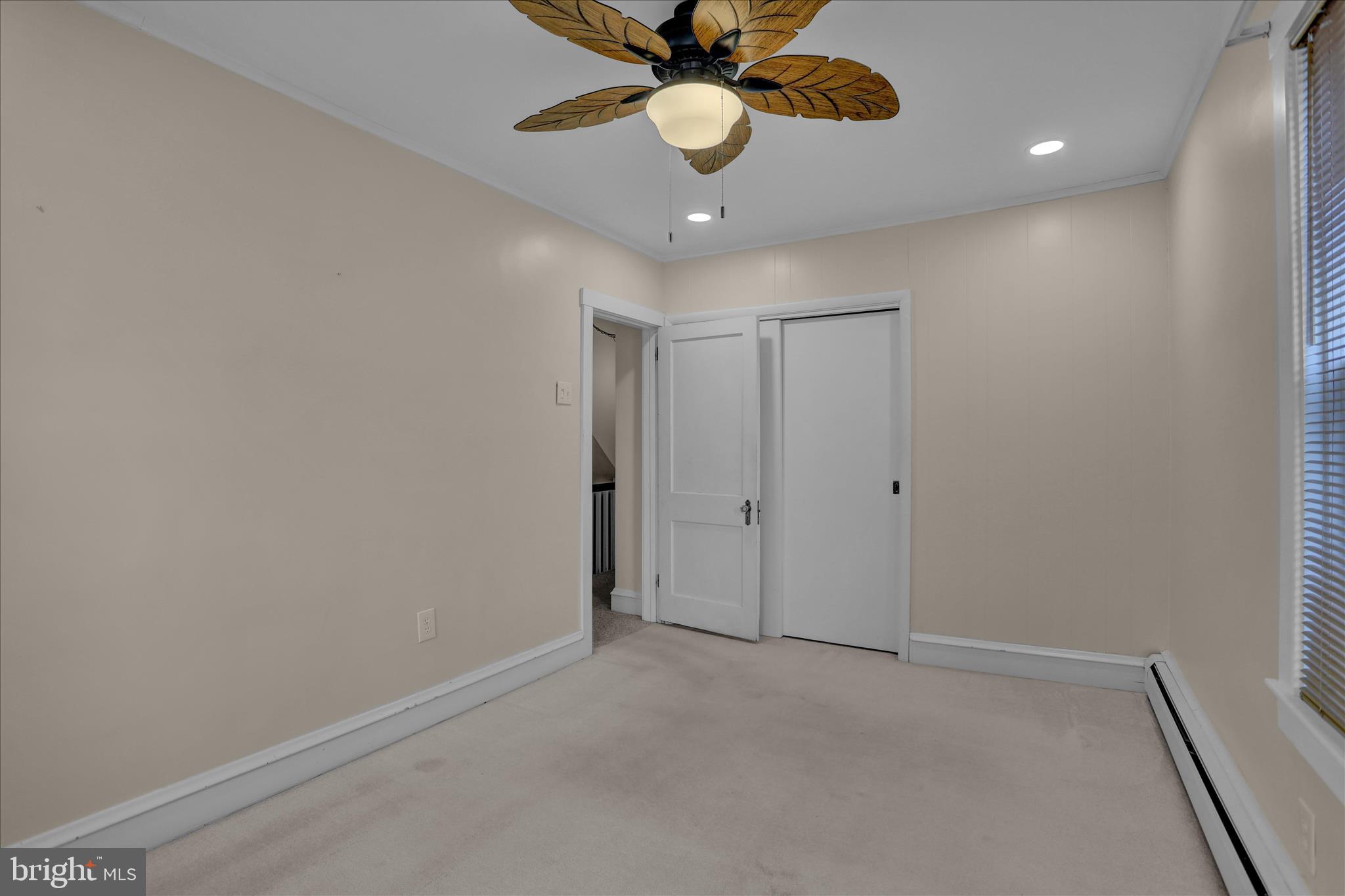 505 Friedensburg Road Reading, PA 19606 - Photo 22 of 40 a view of an empty room and a chandelier fan