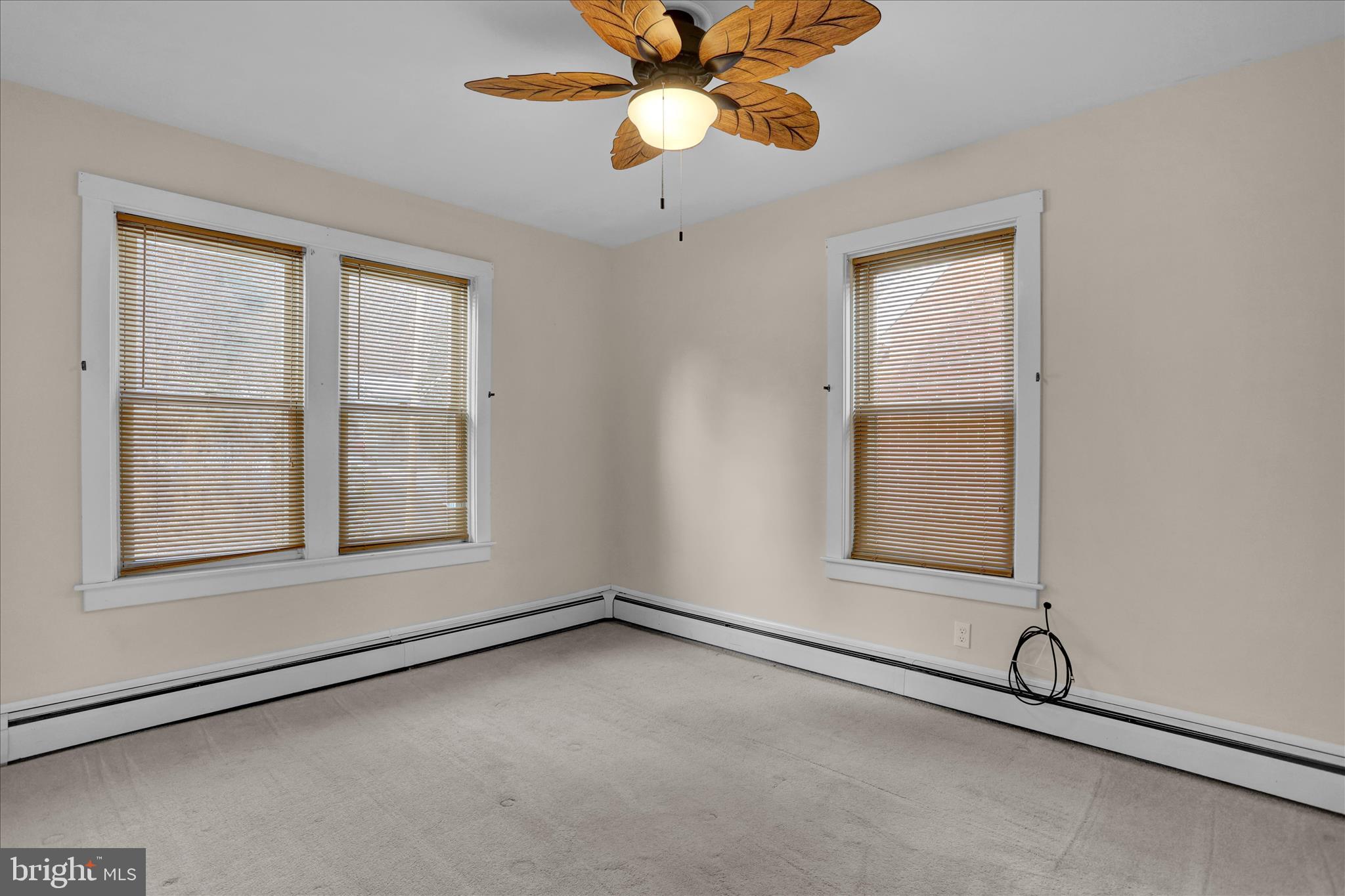 505 Friedensburg Road Reading, PA 19606 - Photo 23 of 40 an empty room with windows and fan