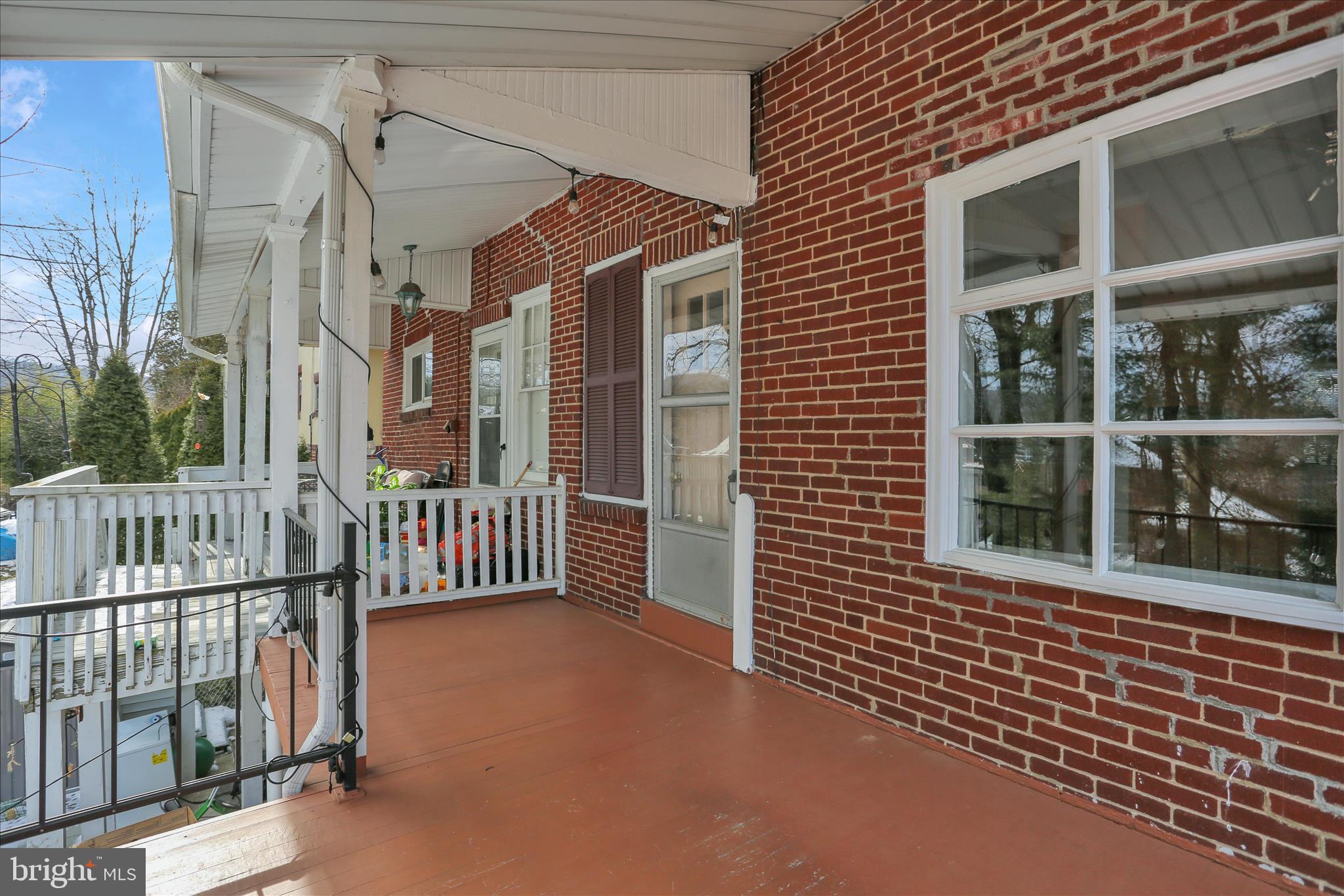 505 Friedensburg Road Reading, PA 19606 - Photo 35 of 40 a view of a brick house with large windows