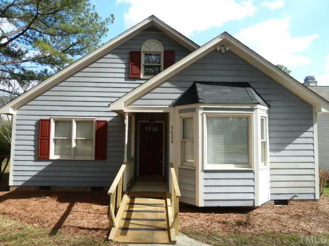 5608 Spring Pines Way Raleigh, NC 27616 - Photo 1 of 15 a front view of a house with a yard