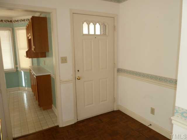 5608 Spring Pines Way Raleigh, NC 27616 - Photo 2 of 15 wooden floor in an empty room