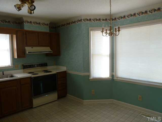 5608 Spring Pines Way Raleigh, NC 27616 - Photo 4 of 15 a view of kitchen and window