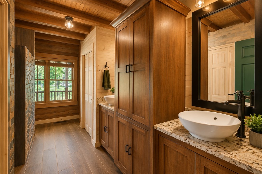 414 Devon Way Anderson, SC 29621 - Photo 16 of 50 Granite counters and rich wood cabinetry define this well-appointed bathroom with natural wood walls and ceiling.