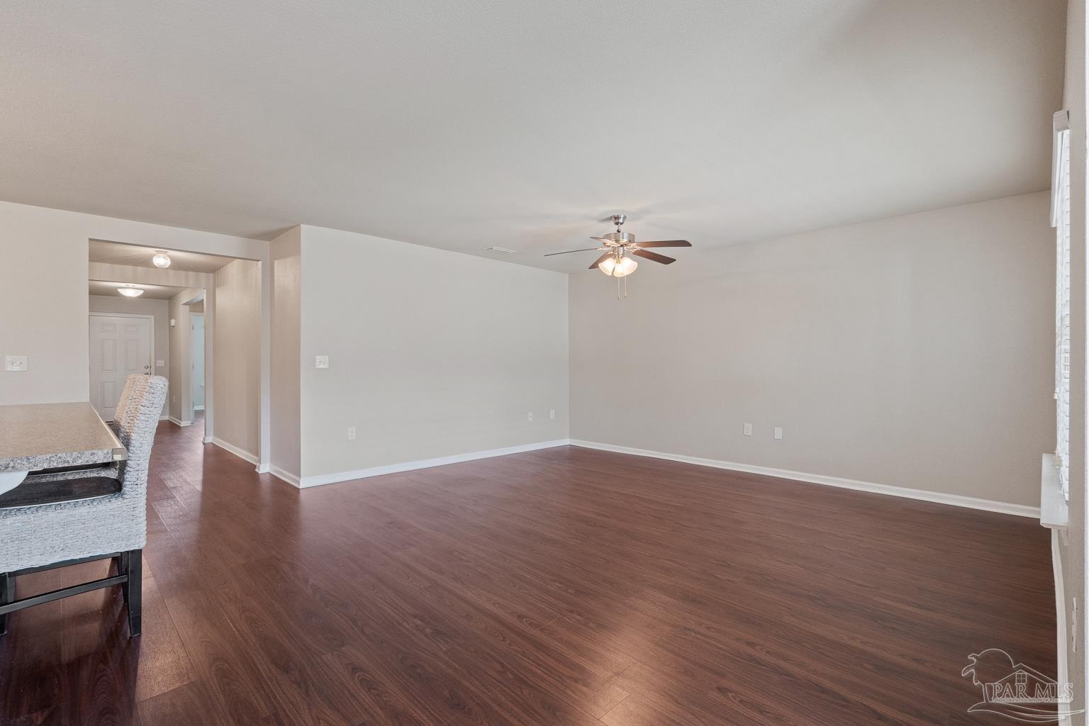 17438 Harding Drive Foley, AL 36535 - Photo 14 of 56 a view of empty room with wooden floor