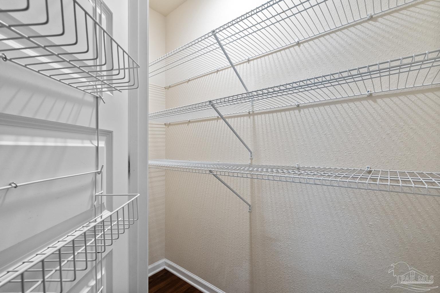17438 Harding Drive Foley, AL 36535 - Photo 23 of 56 a view of a room with racks on the wall