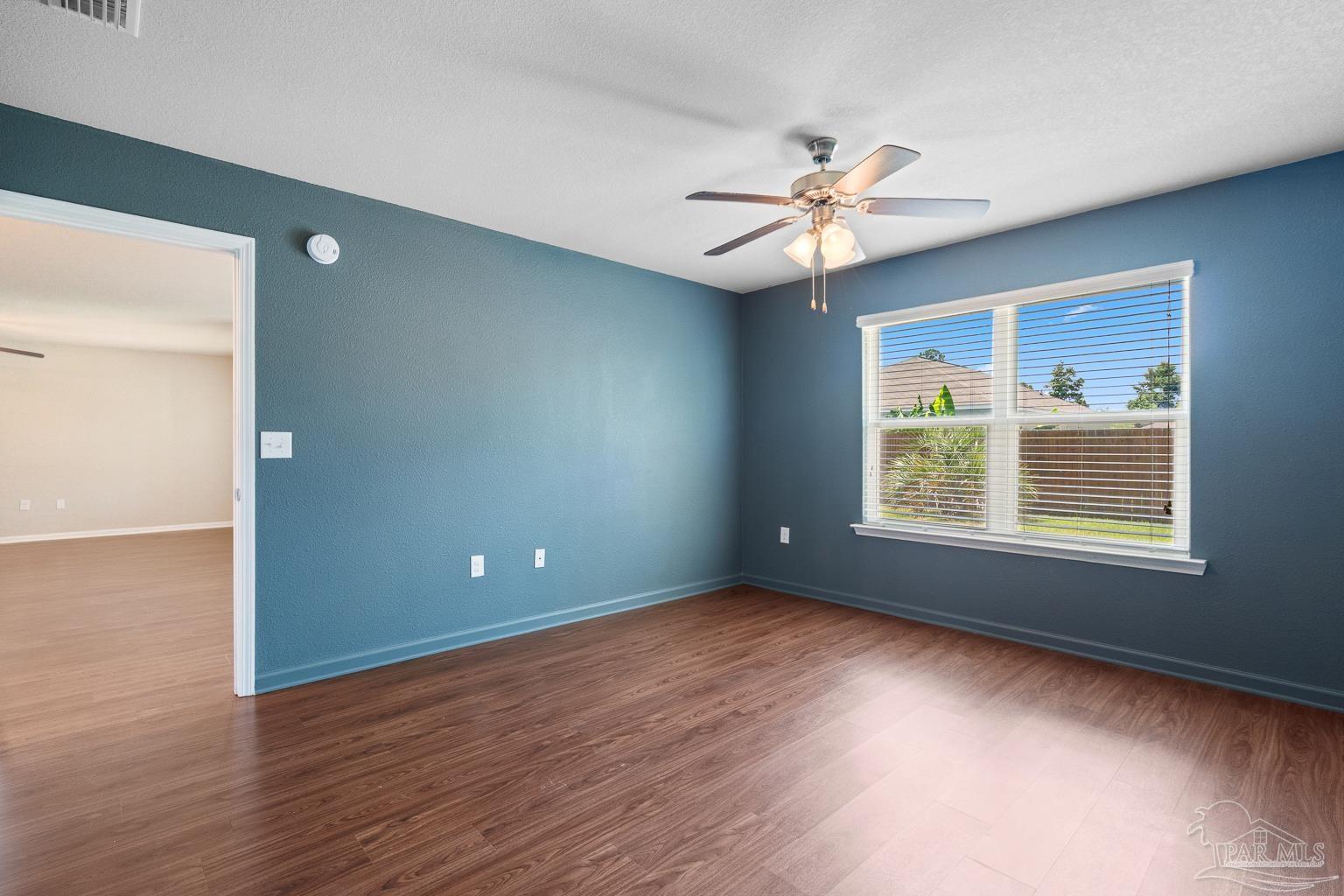 17438 Harding Drive Foley, AL 36535 - Photo 28 of 56 a view of a livingroom with a ceiling fan and window