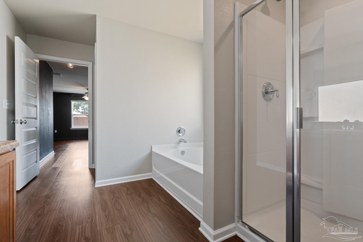 17438 Harding Drive Foley, AL 36535 - Photo 34 of 56 a bathroom with a bathtub and a view of bathroom