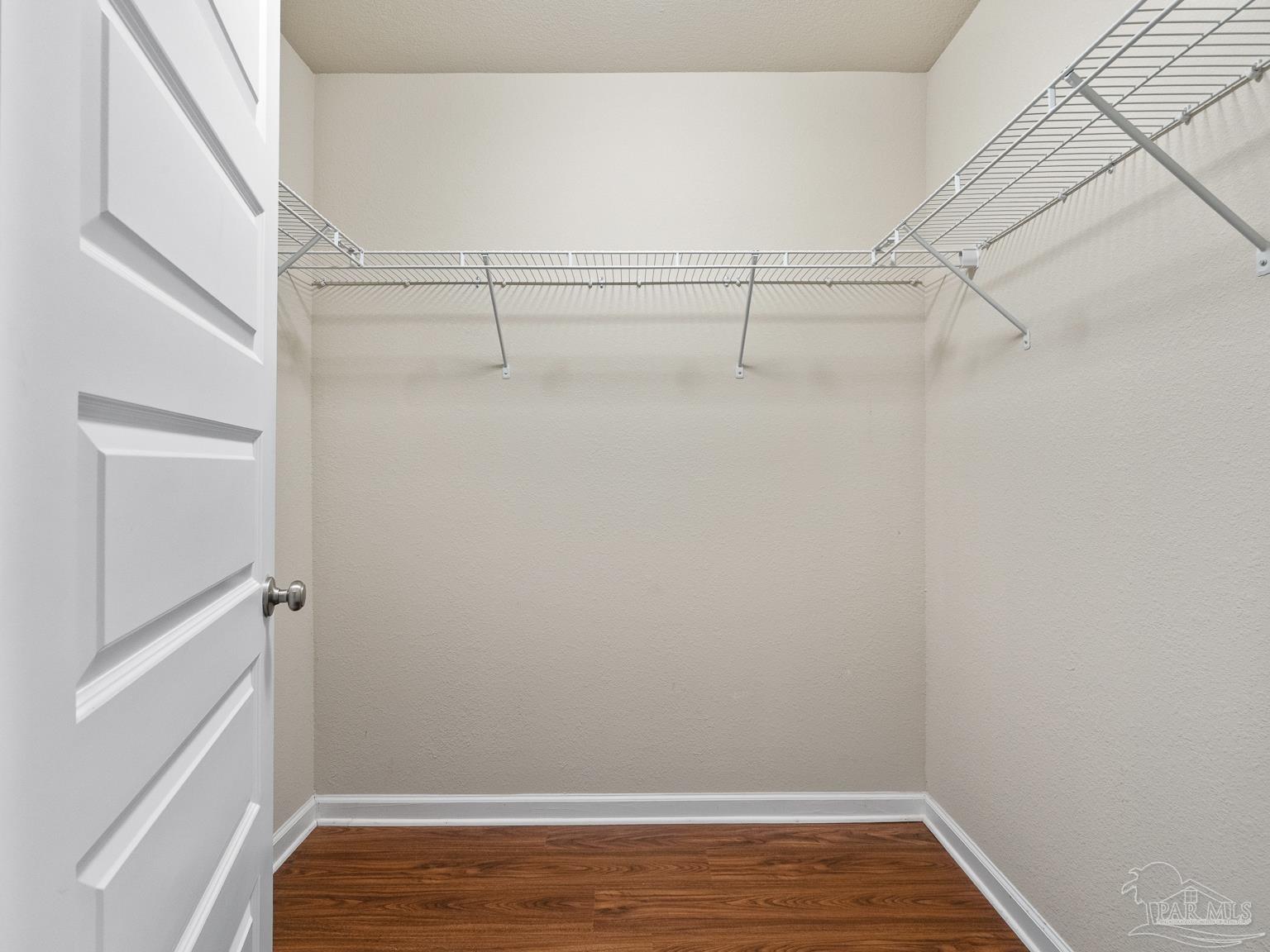 17438 Harding Drive Foley, AL 36535 - Photo 36 of 56 a view of a room with racks on the wall