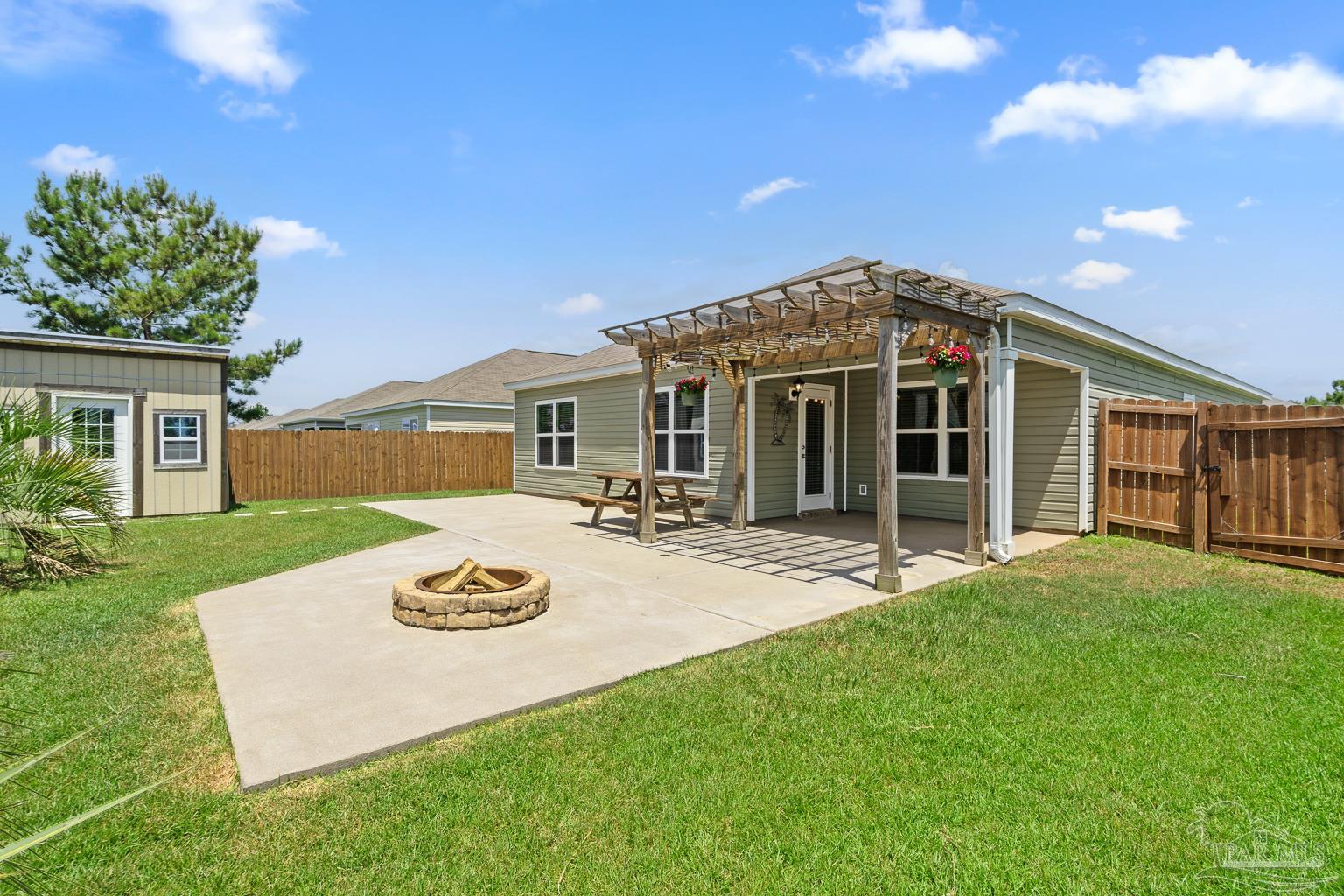 17438 Harding Drive Foley, AL 36535 - Photo 39 of 56 a view of a house with backyard and garden