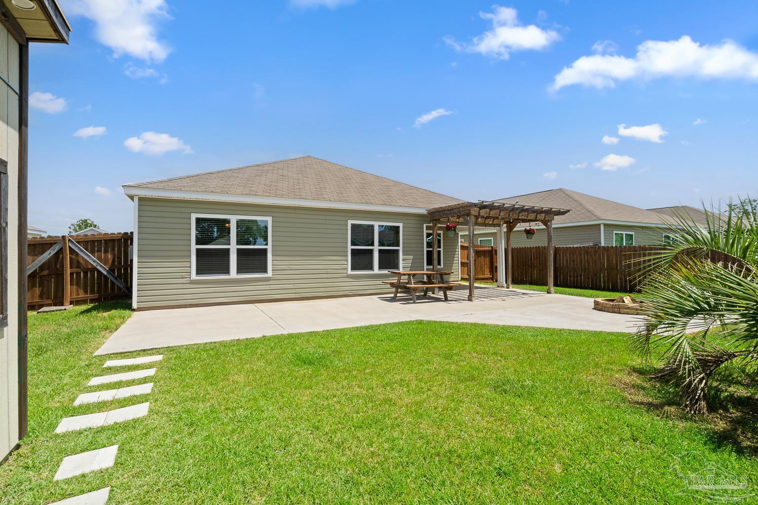 17438 Harding Drive Foley, AL 36535 - Photo 41 of 56 a front view of a house with swimming pool having outdoor seating