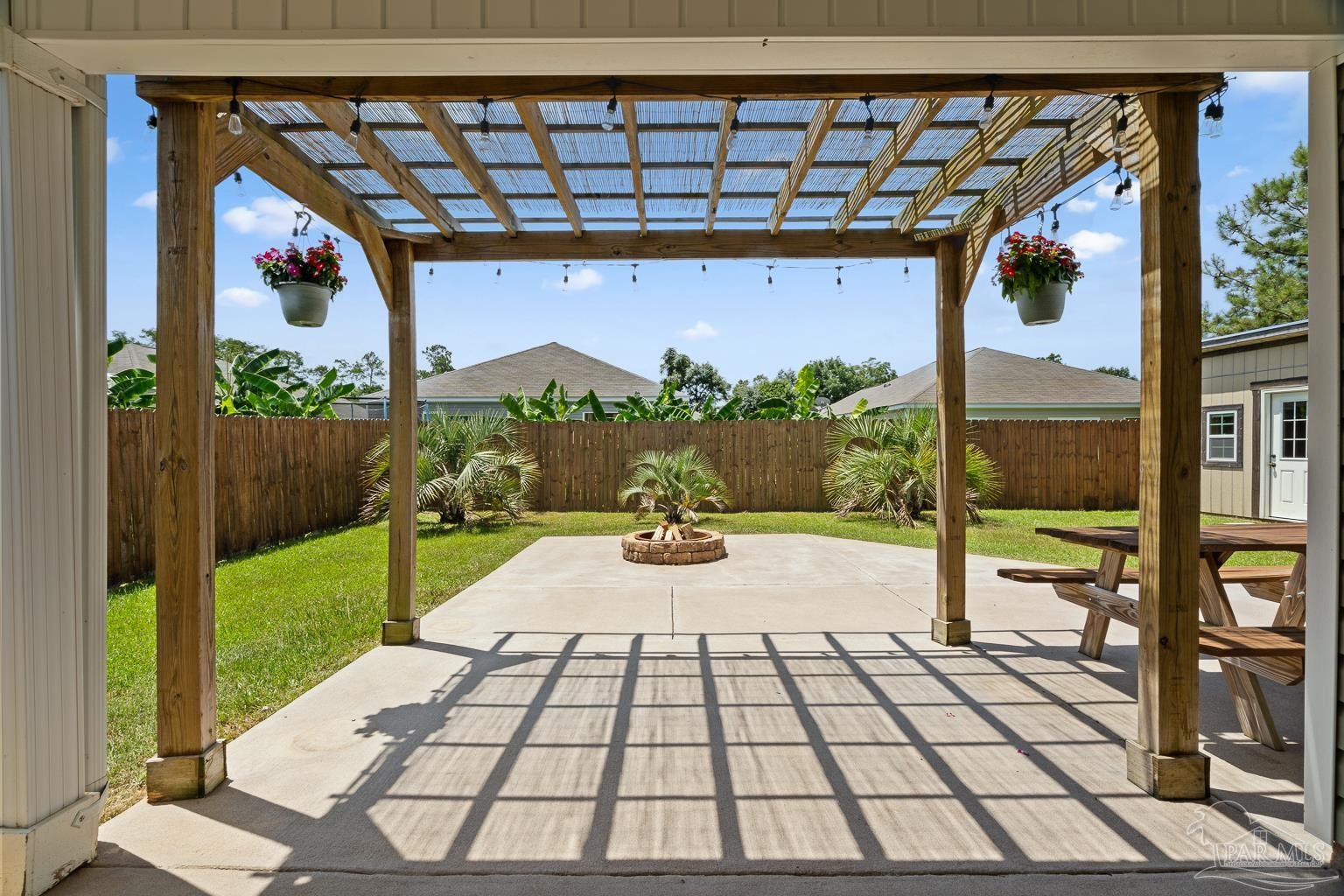17438 Harding Drive Foley, AL 36535 - Photo 42 of 56 a view of a porch with wooden floor