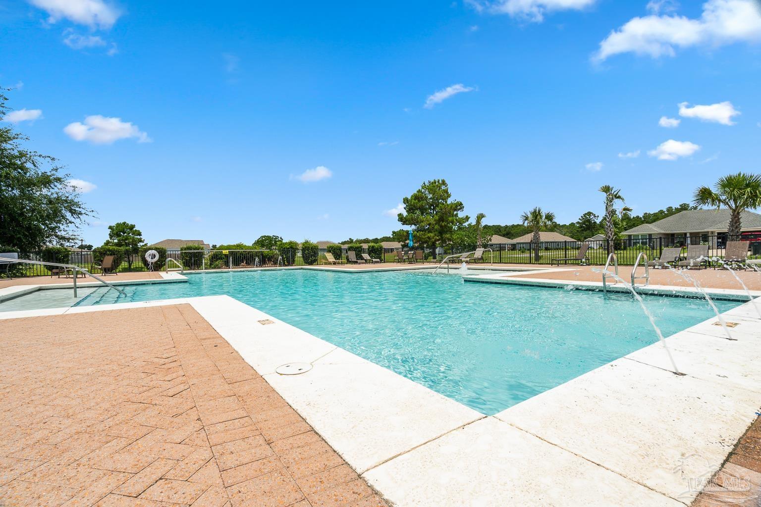 17438 Harding Drive Foley, AL 36535 - Photo 50 of 56 a view of a swimming pool and a yard
