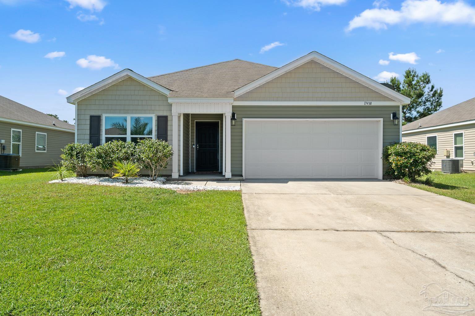 17438 Harding Drive Foley, AL 36535 - Photo 5 of 56 a front view of a house with garden