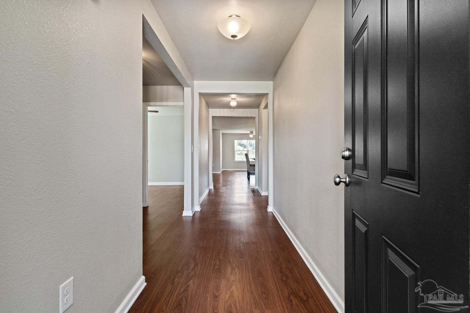 17438 Harding Drive Foley, AL 36535 - Photo 6 of 56 a view of a hallway with wooden floor