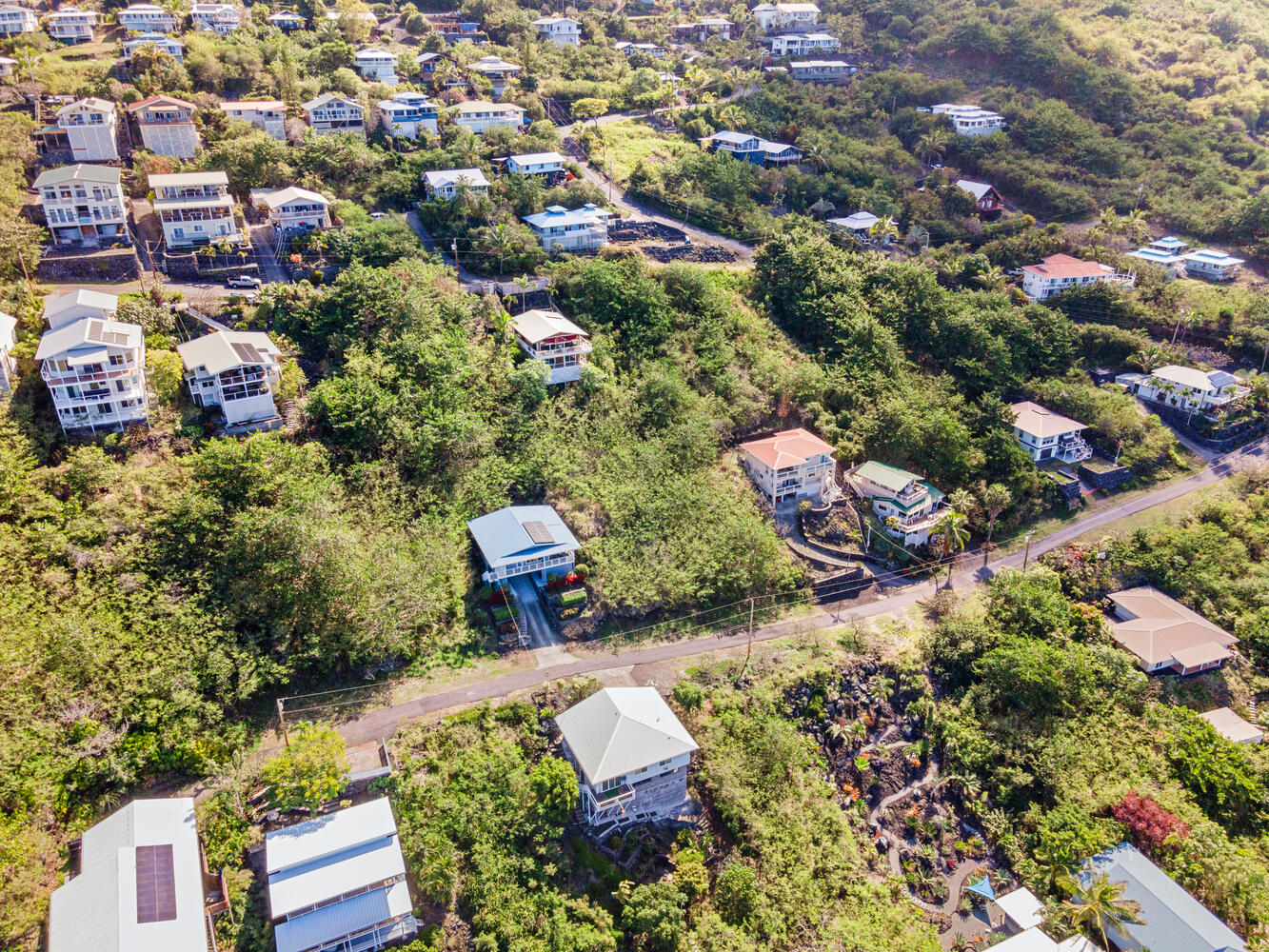 146 Fern Road Captain Cook, HI 96704 - Photo 4 of 9 an aerial view of a houses with a yard