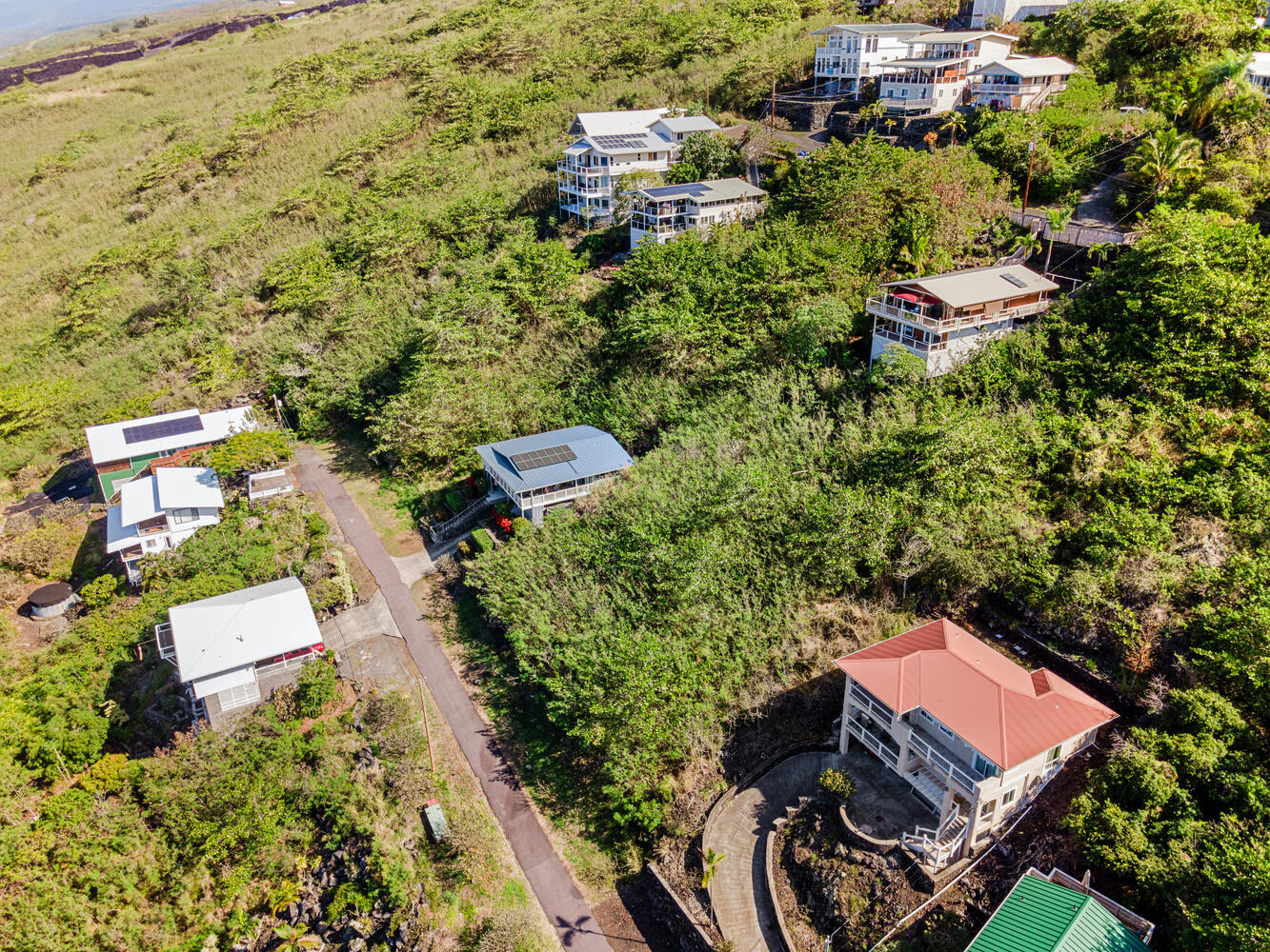 146 Fern Road Captain Cook, HI 96704 - Photo 4 of 9 an aerial view of a house with a yard