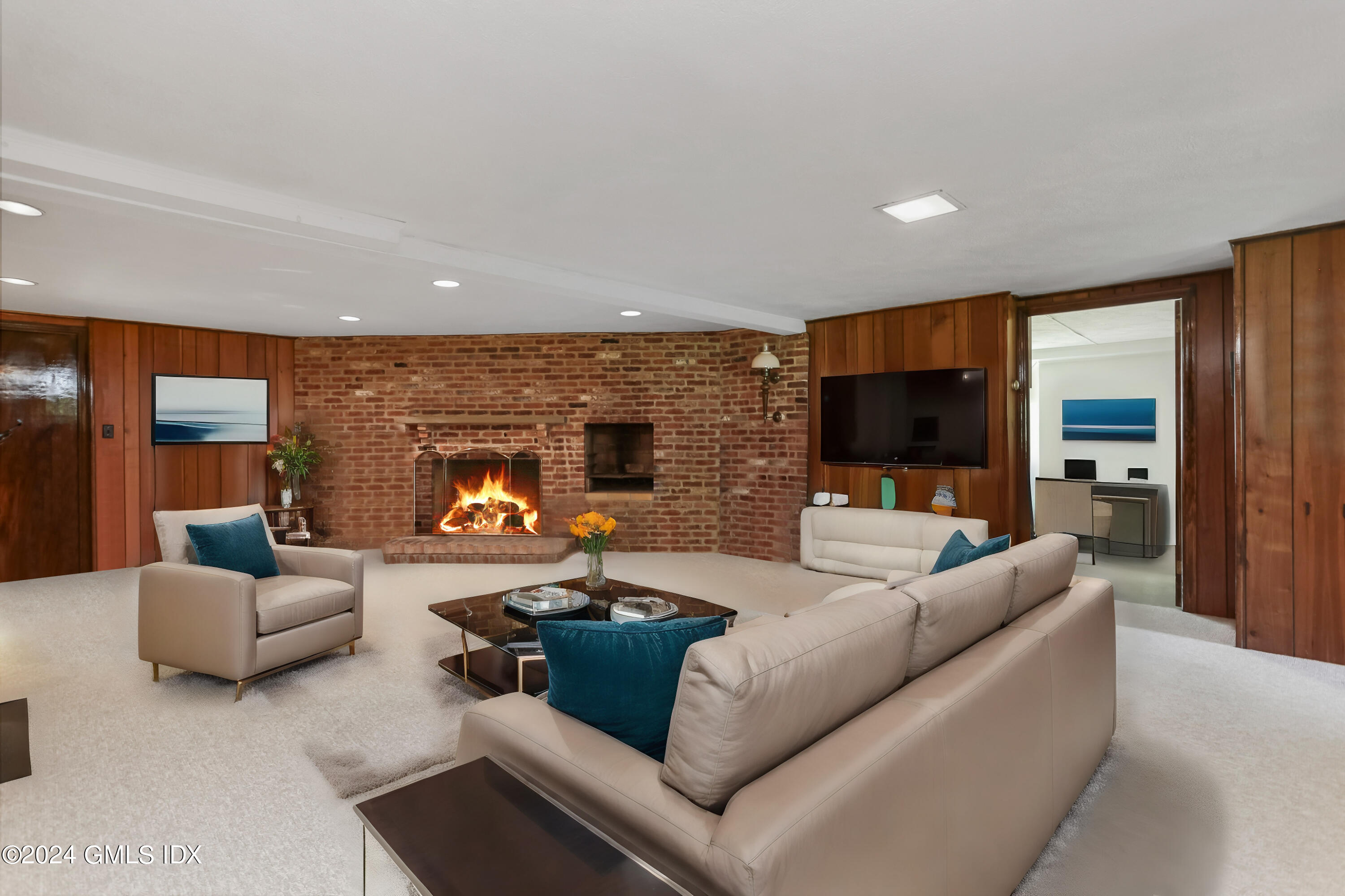 34 Hill Road Greenwich, CT 06830 - Photo 13 of 22 a living room with furniture and a flat screen tv