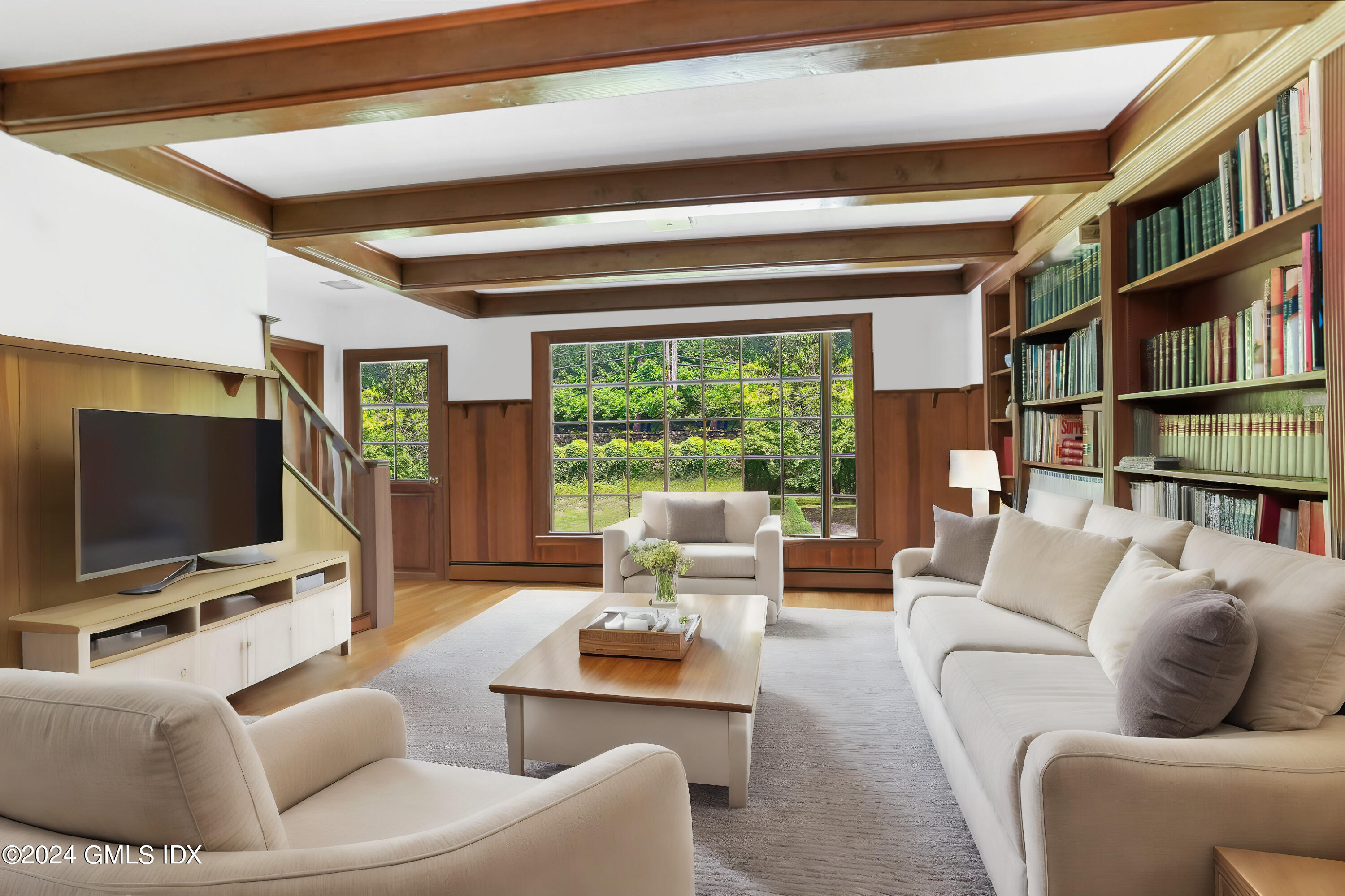 34 Hill Road Greenwich, CT 06830 - Photo 8 of 22 a living room with furniture and a flat screen tv