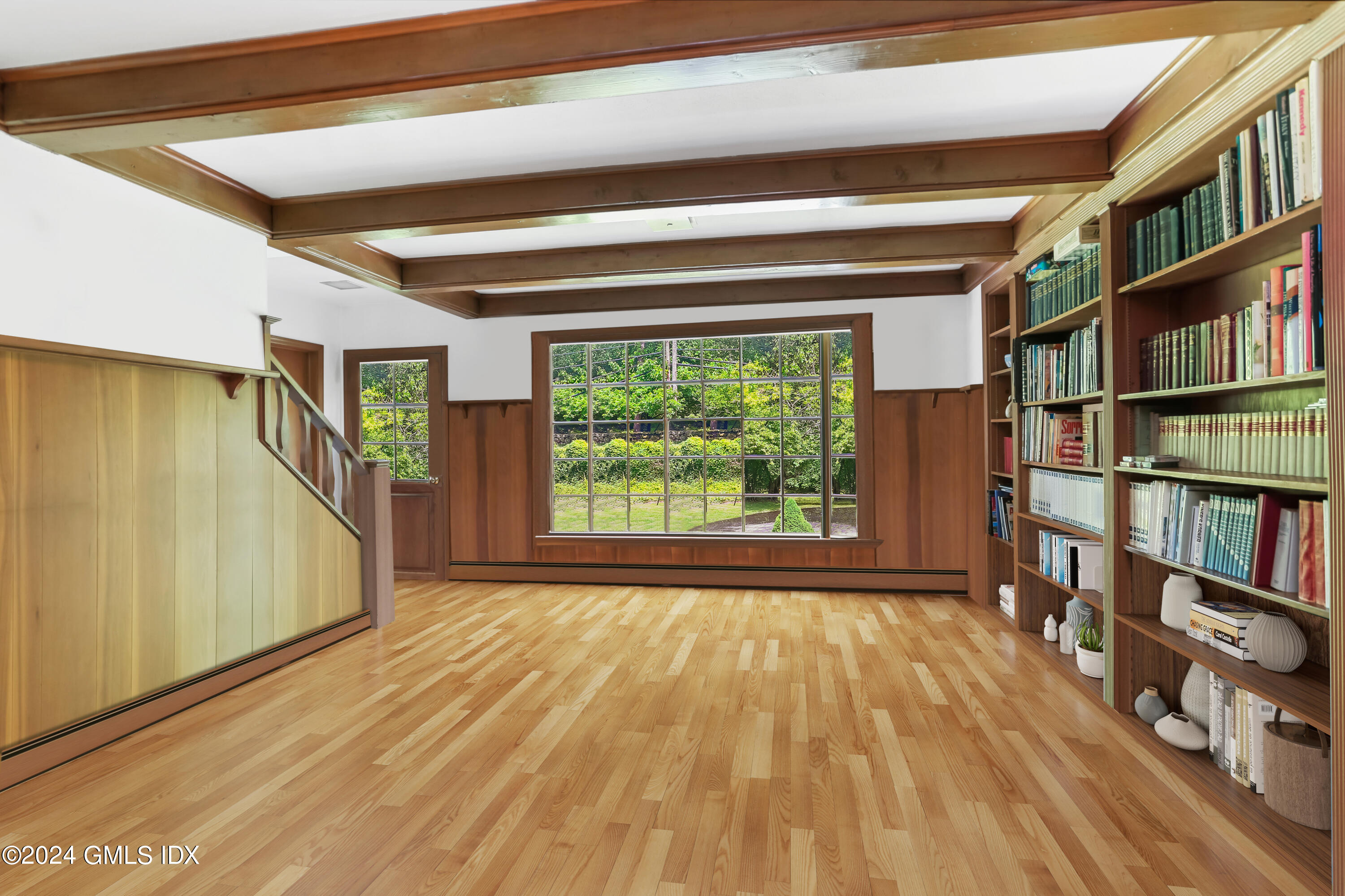 34 Hill Road Greenwich, CT 06830 - Photo 9 of 22 a view of room with windows and book shelf