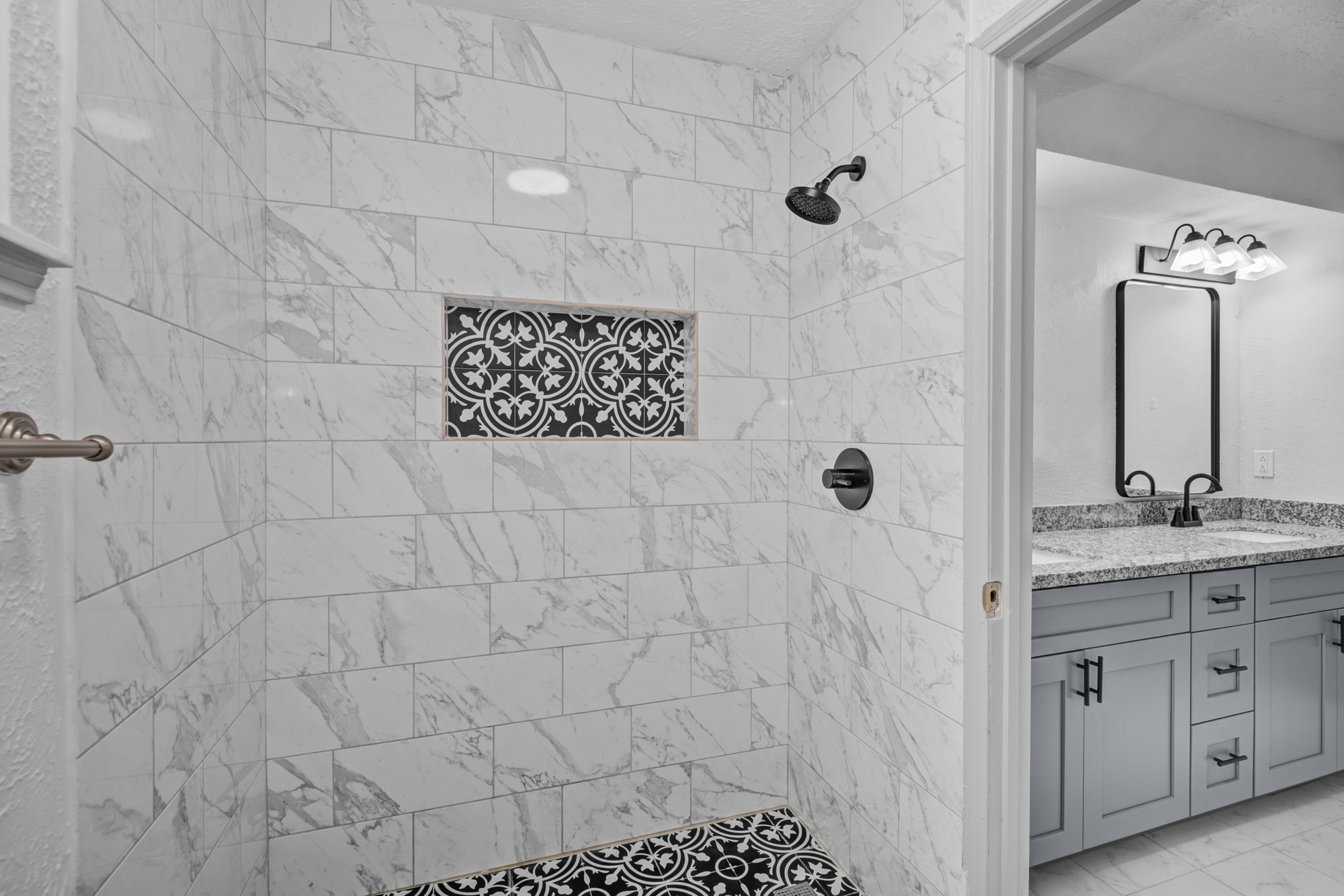 13747 Rampchester Lane Houston, TX 77015 - Photo 24 of 24 a bathroom with a shower and a sink