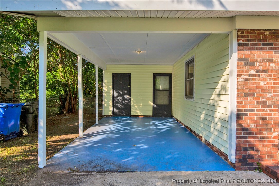 417 Perth Street Fayetteville, NC 28314 - Photo 4 of 30 a view of a room with wooden floor and windows