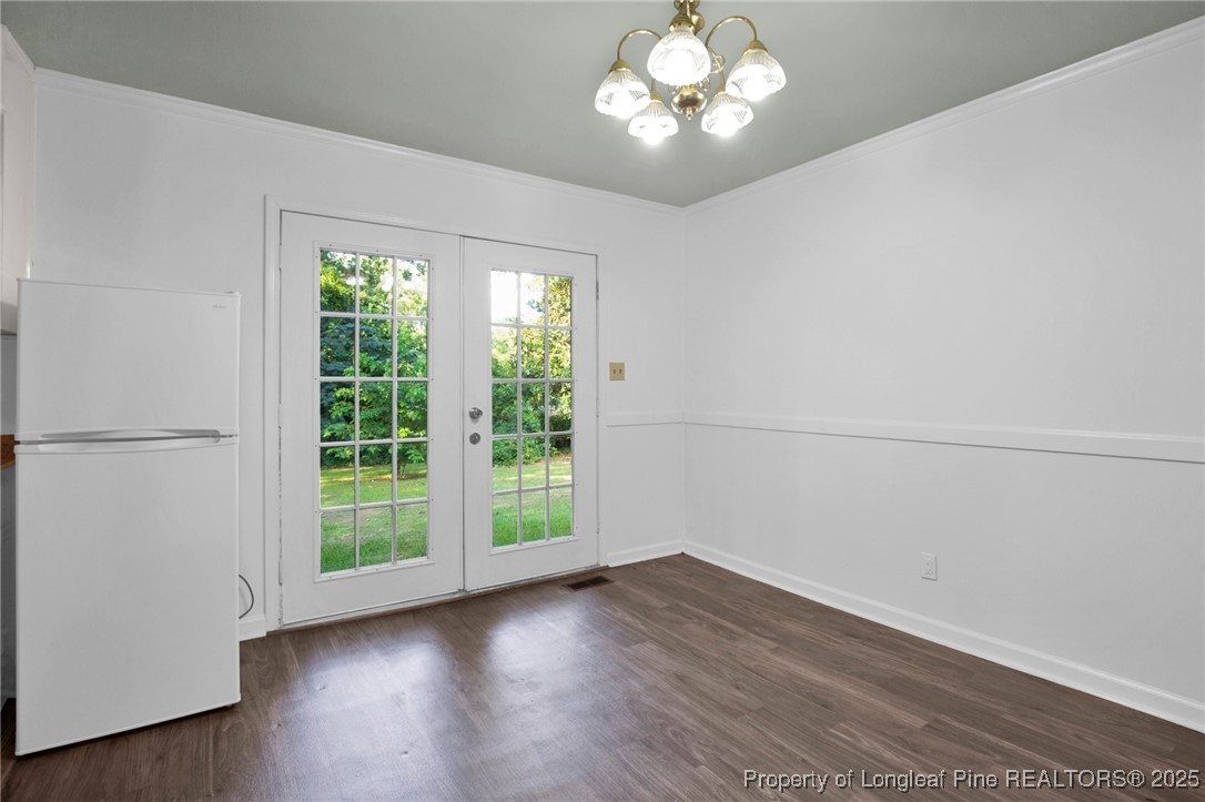 417 Perth Street Fayetteville, NC 28314 - Photo 10 of 30 a view of a room with wooden floor and a window