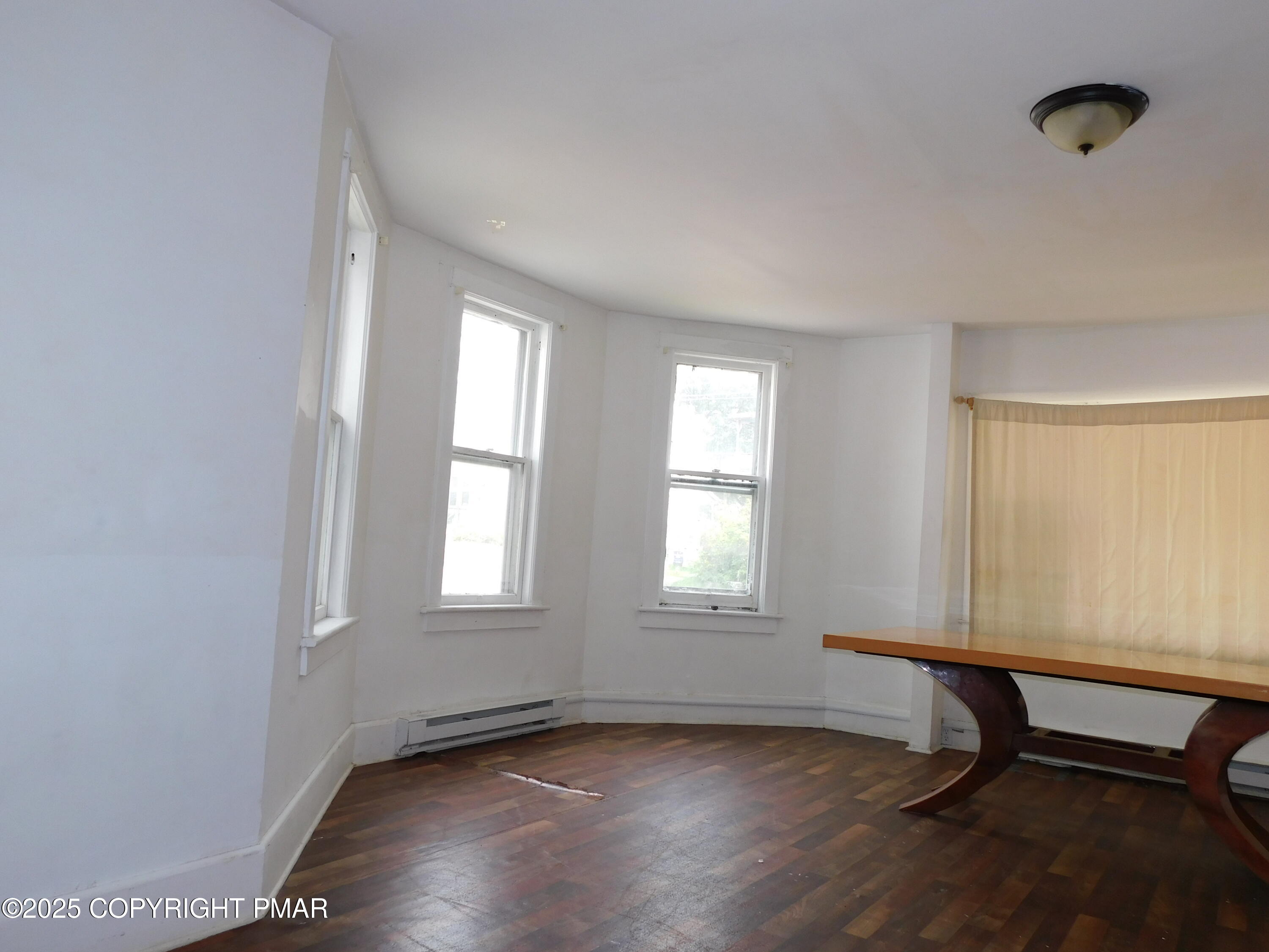 112 Ridgeway Street East Stroudsburg, PA 18301 - Photo 13 of 39 an empty room with windows