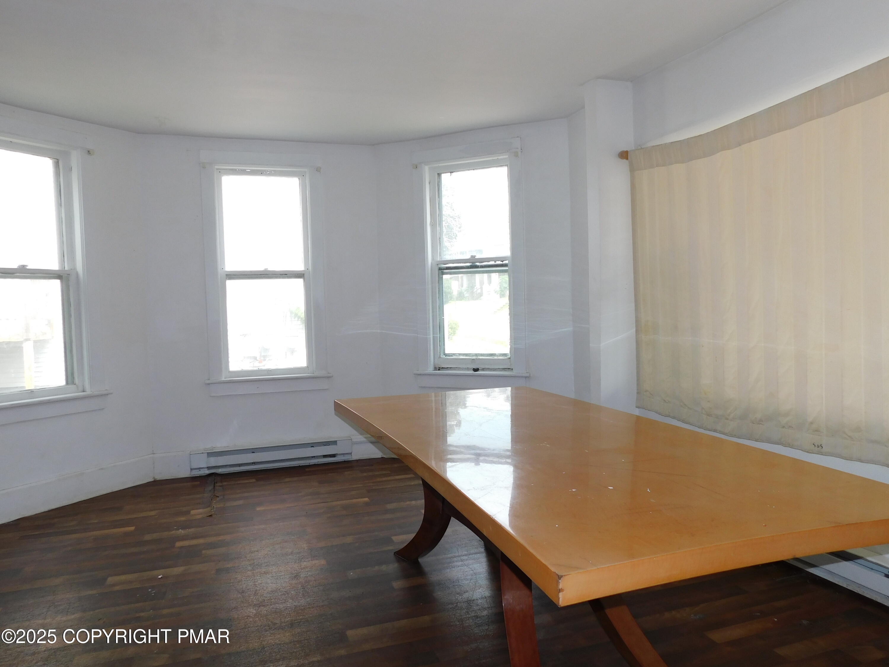 112 Ridgeway Street East Stroudsburg, PA 18301 - Photo 14 of 39 a view of a room with wooden floor and a window