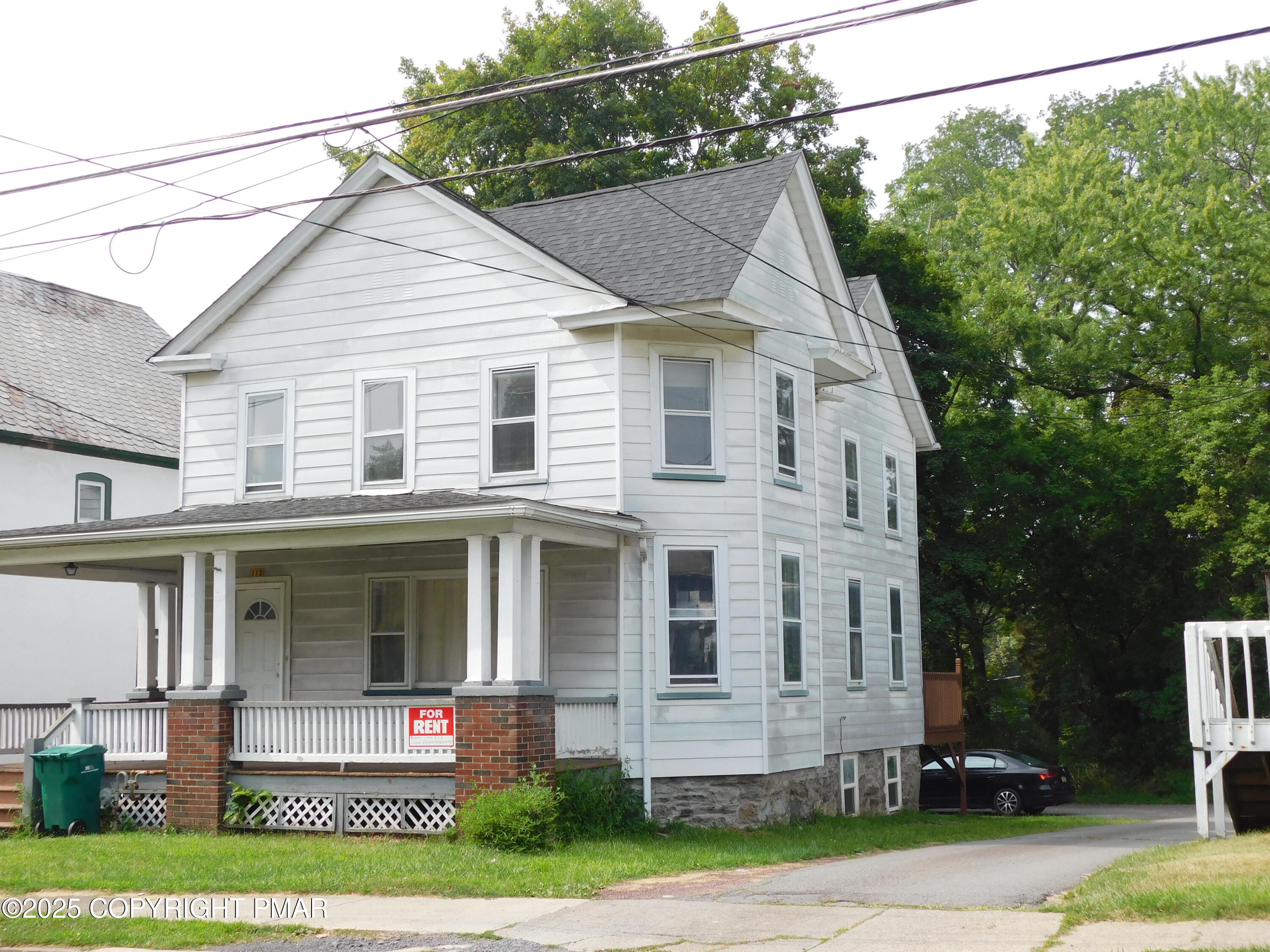 112 Ridgeway Street East Stroudsburg, PA 18301 - Photo 2 of 39 a front view of a house with a yard