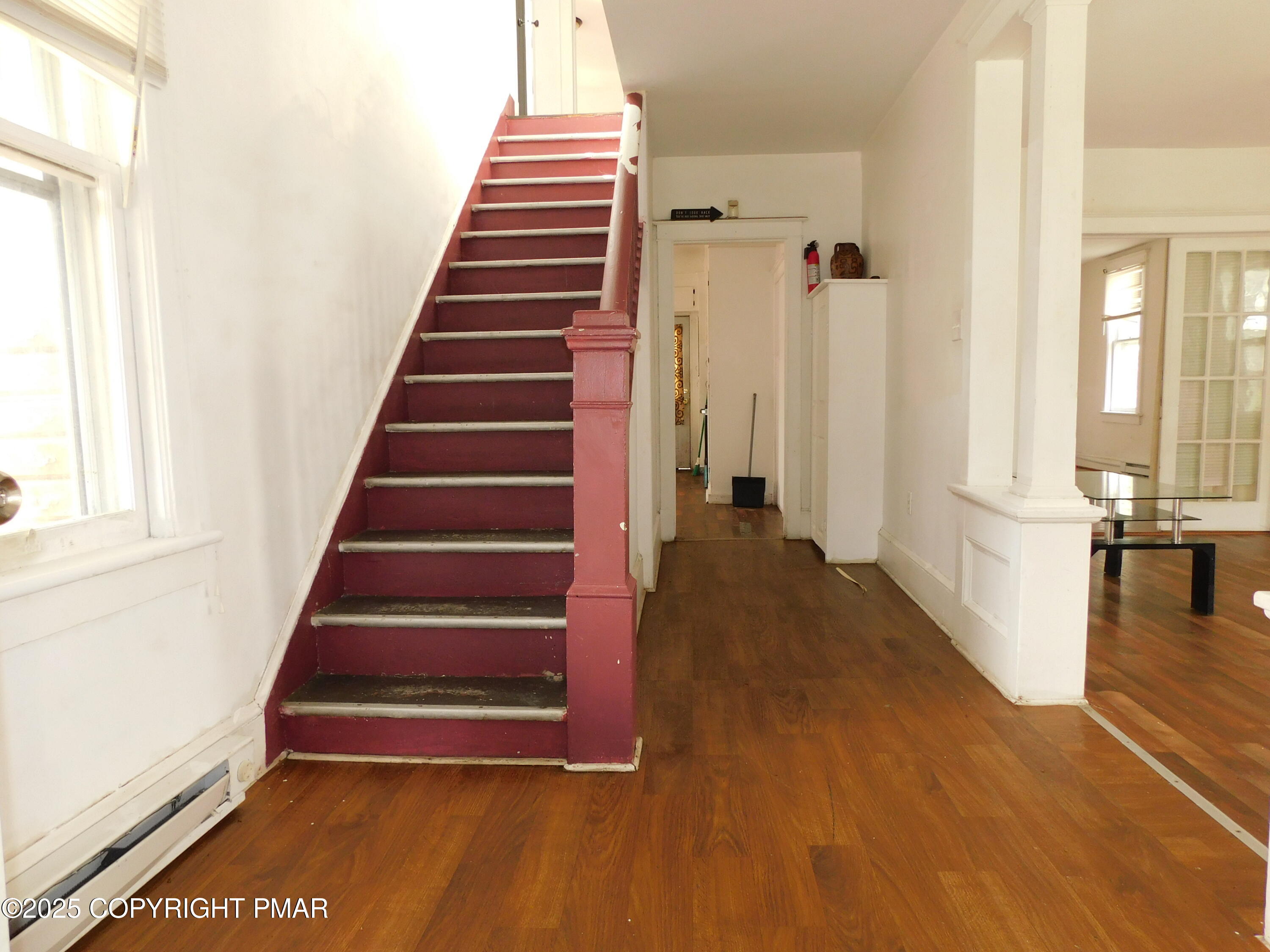 112 Ridgeway Street East Stroudsburg, PA 18301 - Photo 23 of 39 a view of an entryway with wooden floor and door