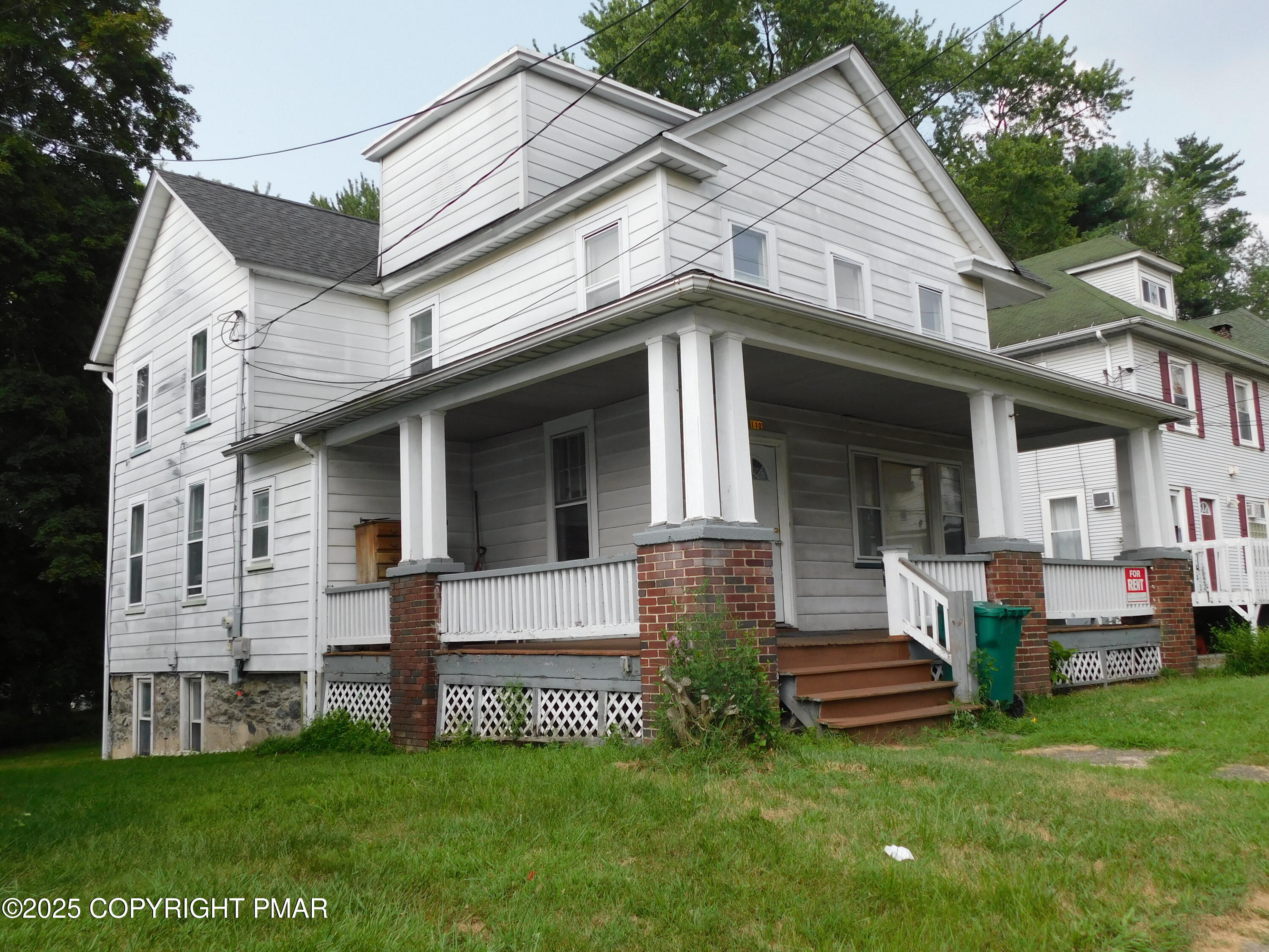 112 Ridgeway Street East Stroudsburg, PA 18301 - Photo 3 of 39 a view of a house with a yard