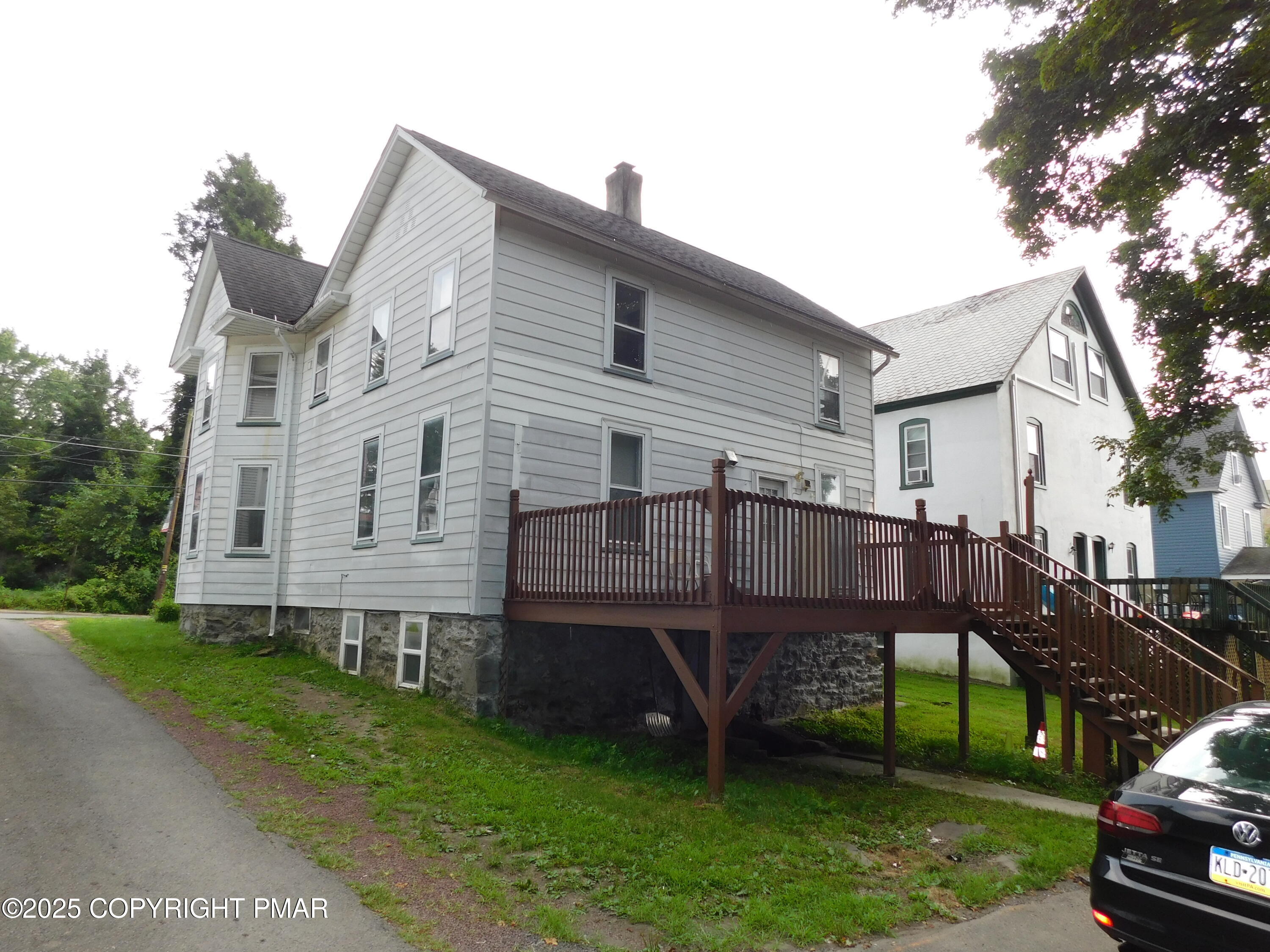 112 Ridgeway Street East Stroudsburg, PA 18301 - Photo 5 of 39 a view of a house with a yard