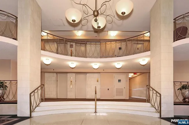 a view of a entryway of a hall