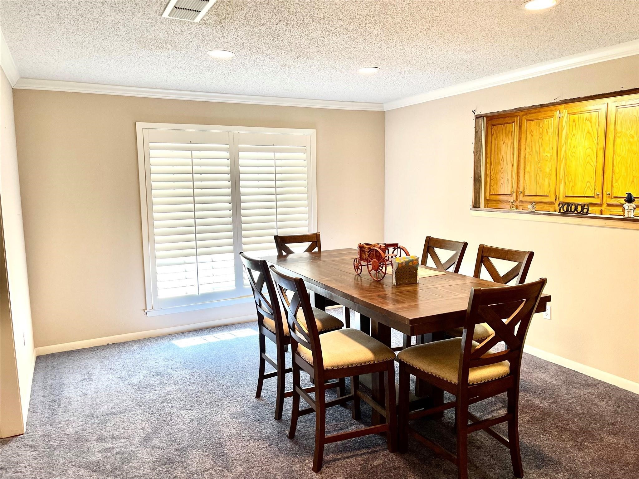 710 South Main Street Coolidge, TX 76635 - Photo 17 of 36 a view of a dining room with furniture and a window